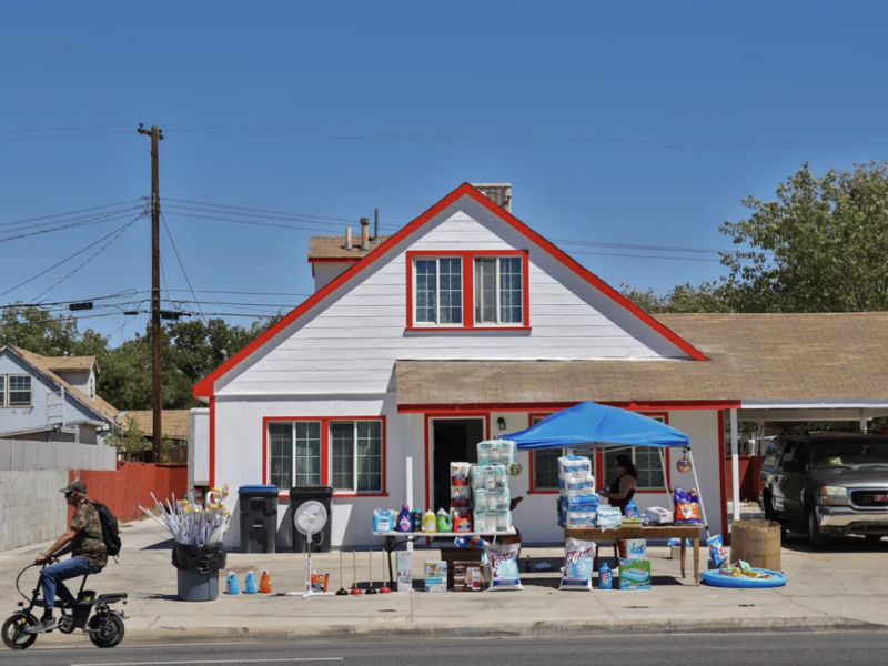 A street vendor sells fans and mini pools in Lancaster on Aug. 15, 2024. Photo by Ted Soqui for CalMatters